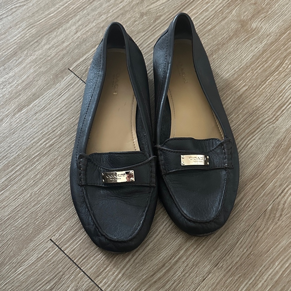 Coach Black Leather Flats with Gold Accent